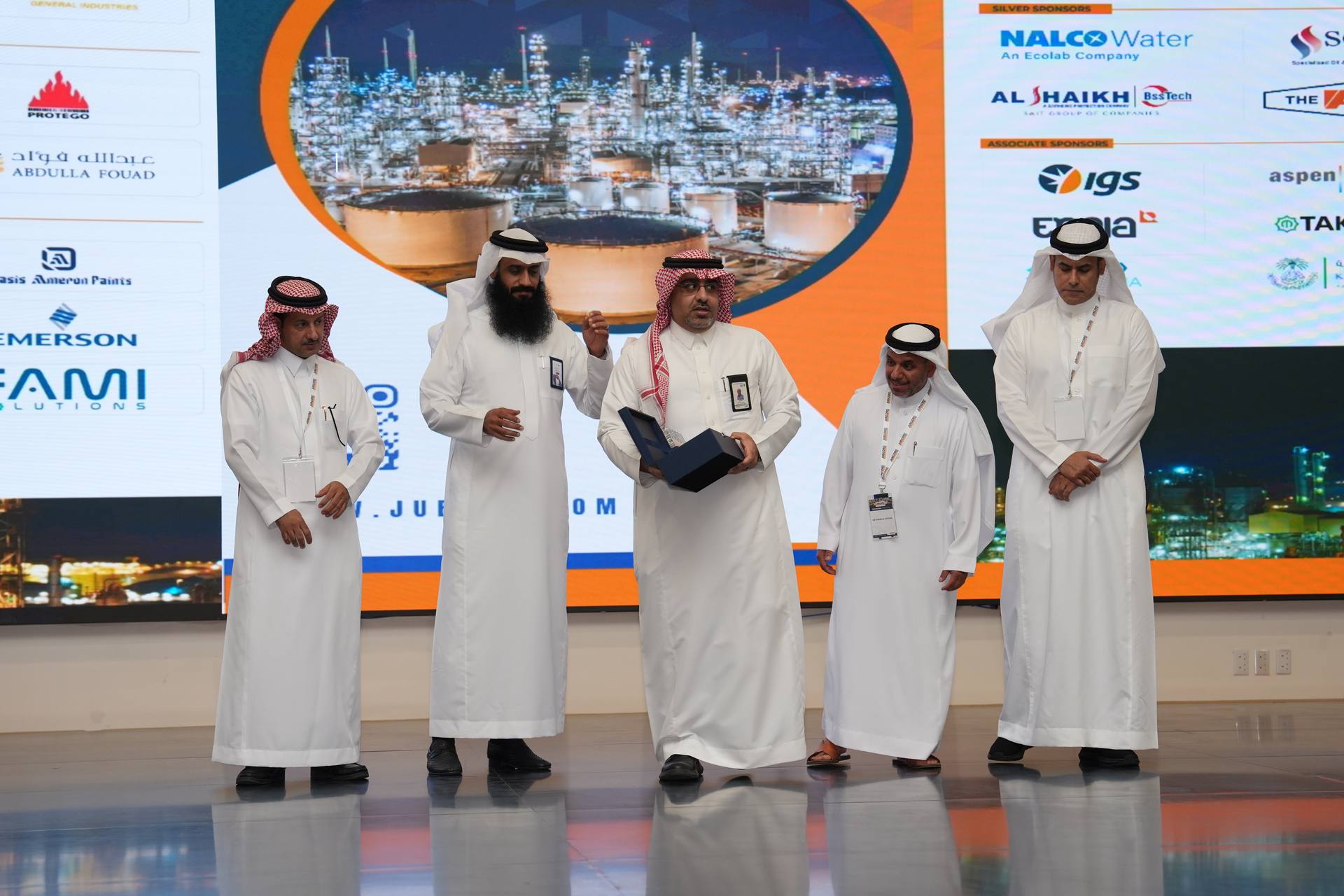 Guests on stage during the ceremony