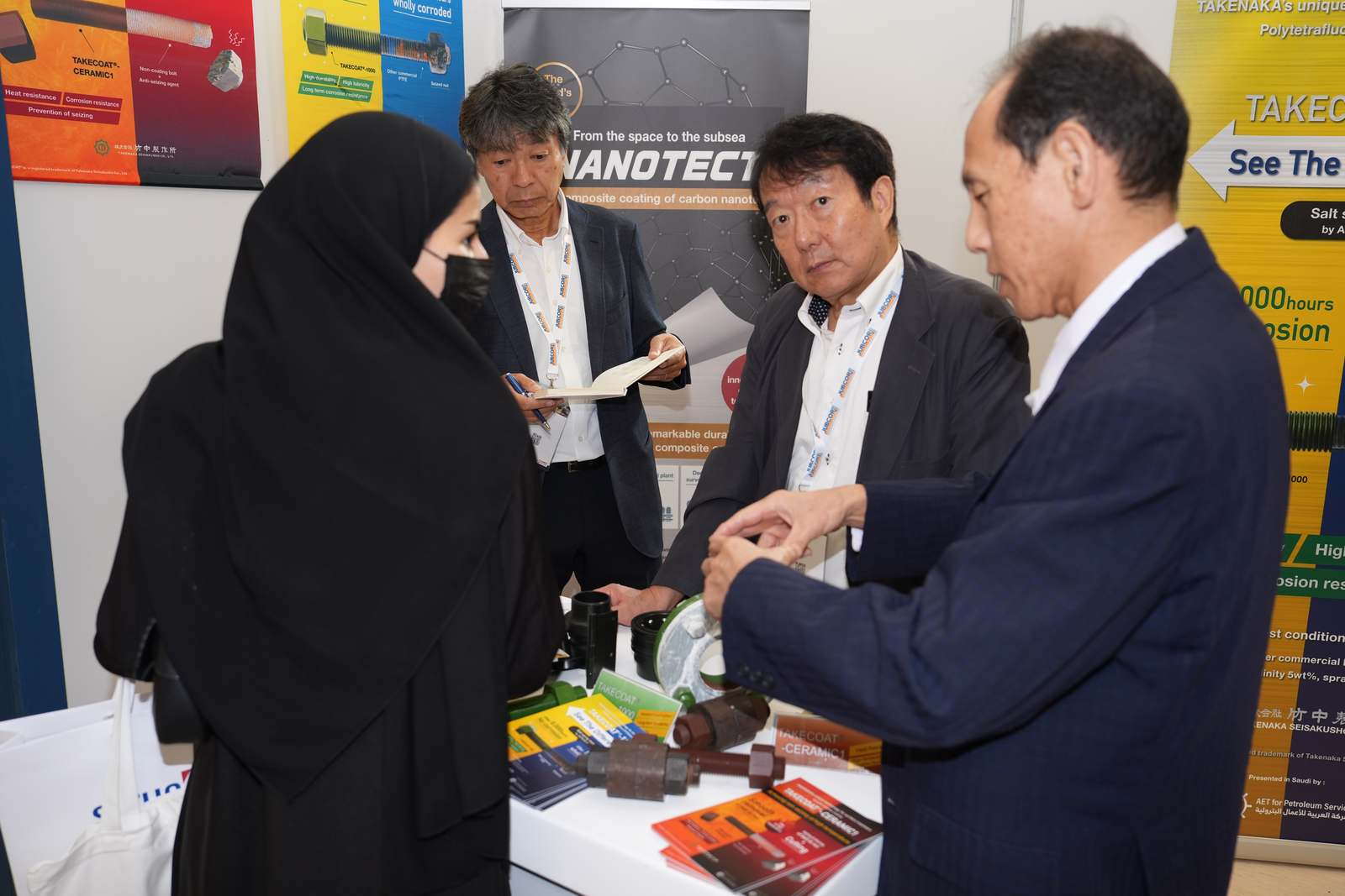 Visitors viewing Takenaka Nanotect coating display