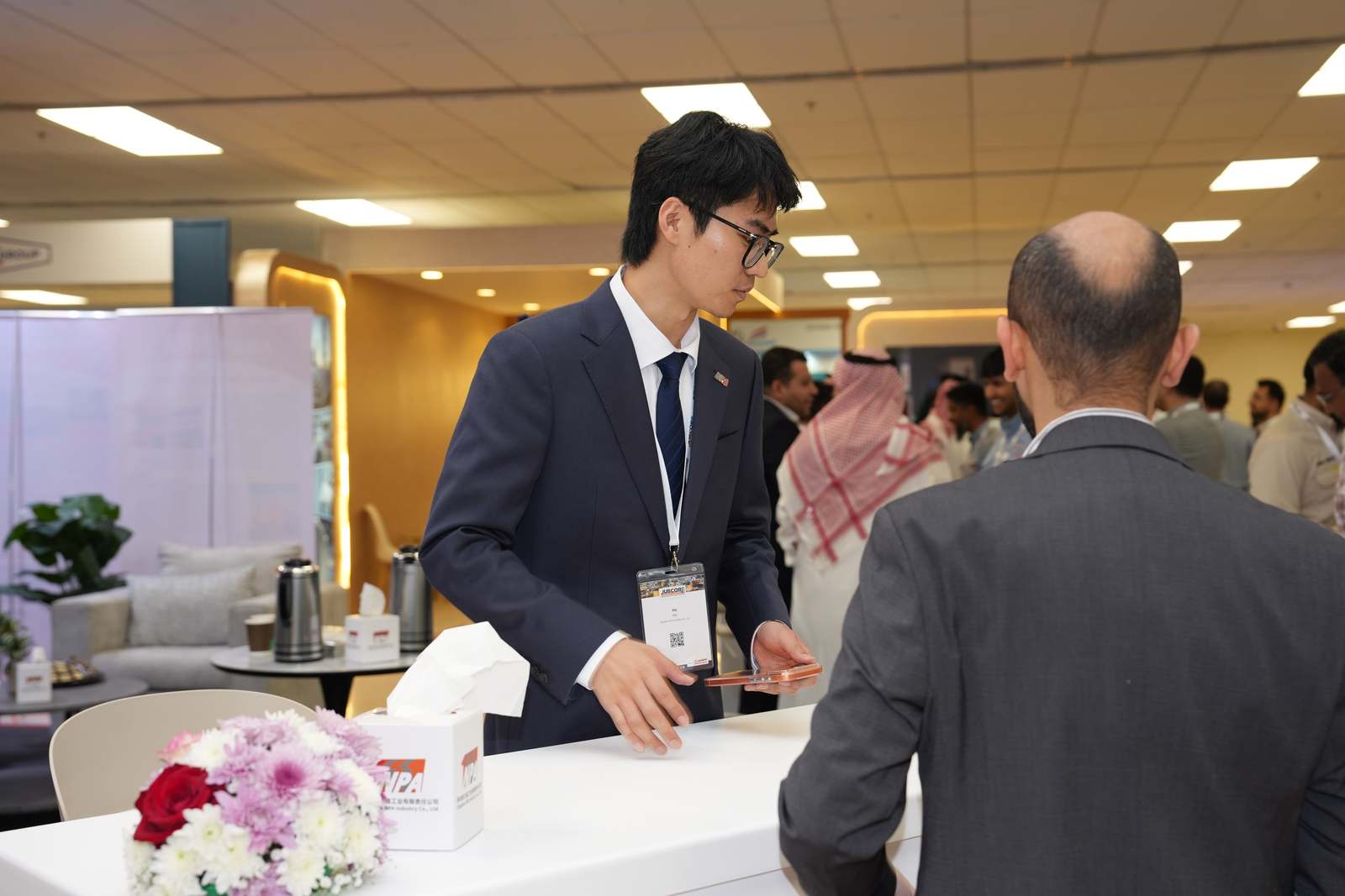 Attendee checking in at the Qingdao NPA booth
