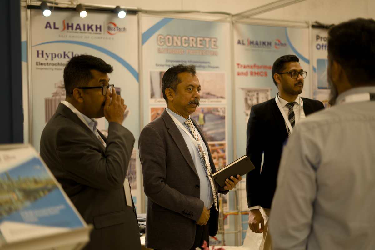 Attendees viewing displays at the Al Shaikh BssTech booth